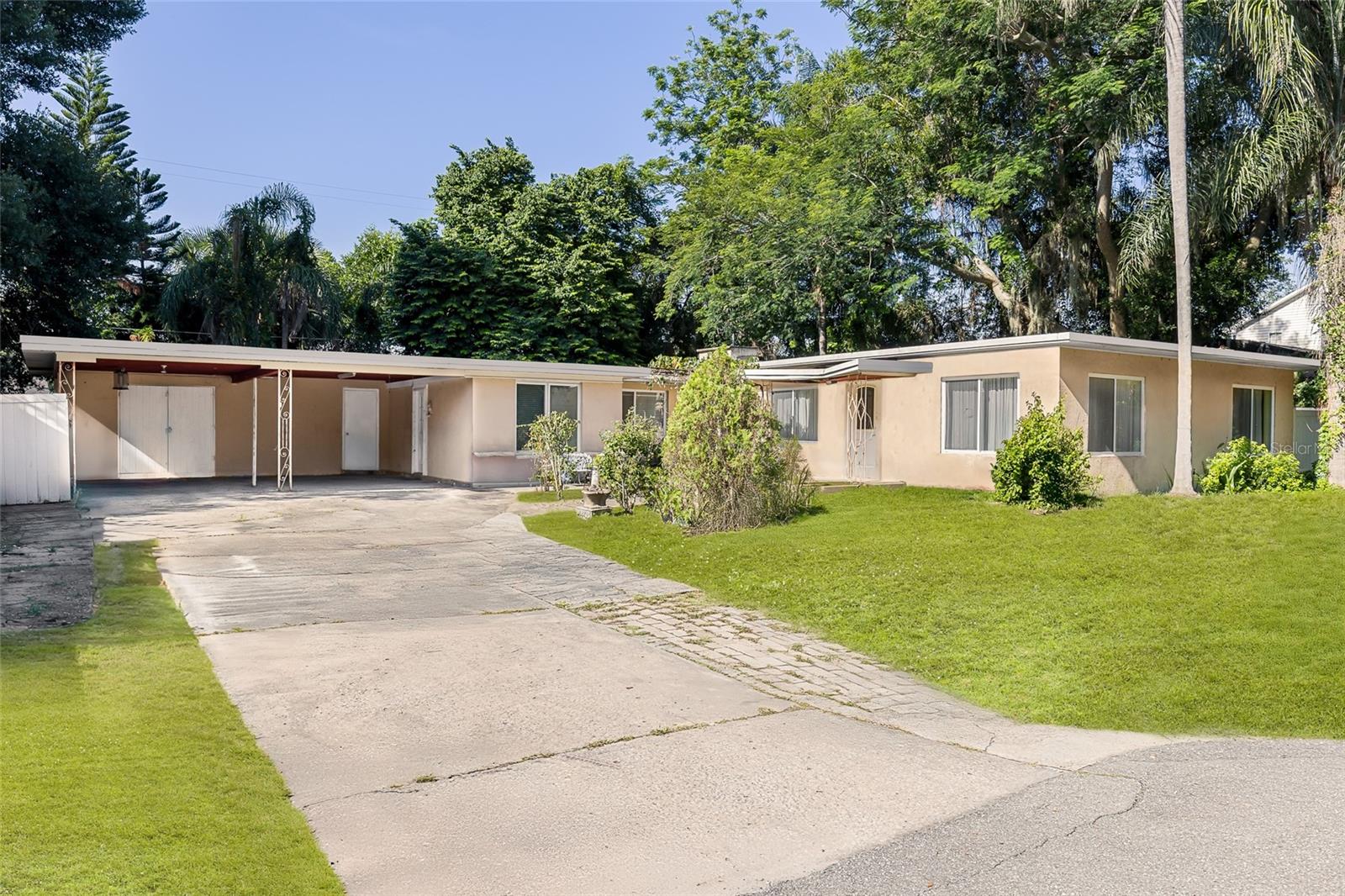 One or more photo(s) has been virtually staged. A rare gem nestled in one of Winter Park’s most secluded subdivisions—just 25 homes tucked into a quiet, tree-lined enclave.
This block-built mid-century home offers four bedrooms, three baths, and sits proudly on a spacious double lot. Inside, travertine floors add timeless elegance, while oversized windows flood the space with natural light—perfect for highlighting your design vision.
Whether you’re leaning into sleek modern style or restoring vintage charm, this blank canvas is primed for your passionate transformation. A renovation ready treasure with solid bones and undeniable potential.
Enjoy a Winter Park address at a fraction of the cost—with no HOA, you have the freedom to renovate, rent, or reinvent without limitations.
Located just 10 minutes from Park Avenue’s upscale shops and restaurants, with top-rated schools nearby and quick access to I-4 for effortless commuting.
This is your opportunity to craft something extraordinary in one of Central Florida’s most coveted locations. Easy to show! Call for your private tour today!