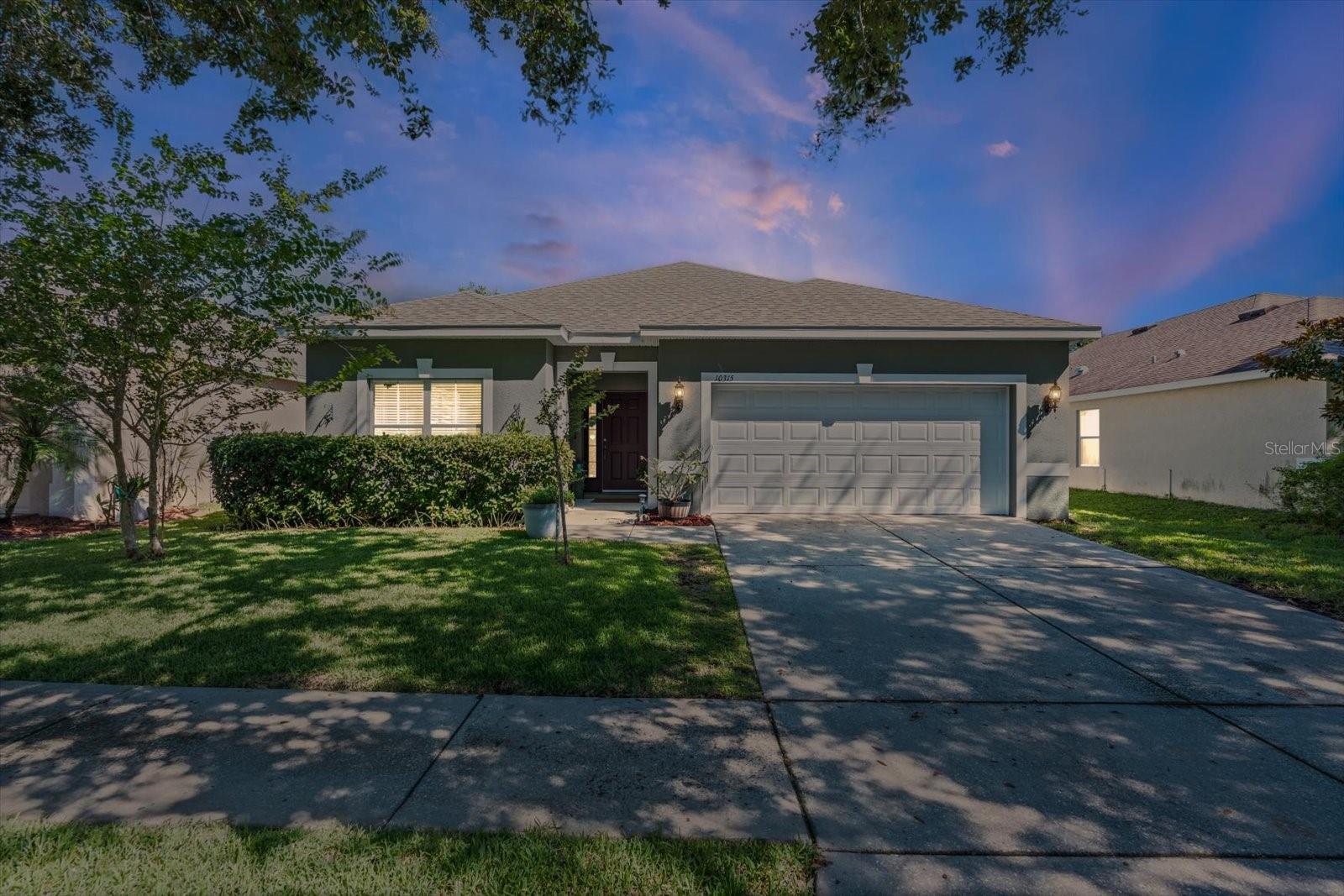 Located in the highly sought-after Belmont community, this beautifully maintained 4-bedroom, 2-bathroom, 2-car garage home is packed with updates and modern features that make it truly stand out. The home offers peace of mind with a brand new roof and paid-off solar panels, keeping monthly electric bills incredibly low. It is generator-ready, with an interlock for easy connection to a portable generator. A new water heater was installed in 2023, and a whole home water softener system adds to the home’s efficiency and comfort. Inside, the home is finished with granite countertops in both the kitchen and bathrooms, laminate wood flooring throughout (no carpet anywhere), and crown molding in every room—including hallways and bathrooms. Five-inch baseboards, updated light fixtures, new faucets and hardware, and newer sinks and toilets add a clean, modern touch throughout the home. One of the standout features is the converted formal living and dining space. Professionally enclosed, it serves as a flexible bonus room—perfect for a home office, gym, media room, or playroom, currently used as a 5th bedroom. The pocket doors and transom window give both privacy and natural light, making this space both functional and inviting.
The primary bedroom has 2 closets, an ensuite bathroom with dual sinks, a shower and a garden tub for the ultimate relaxation experience. The outdoor space is equally impressive with an upgraded irrigation system featuring a new control panel, replaced sprinkler heads, and additional lines added to support backyard landscaping or gardening. The garage is also equipped with mounted storage racks for added convenience. LOW CDD AND LOW HOA AND FLOOD ZONE X. Located in a vibrant, amenity-rich community with 2 community pools, playgrounds, tennis and basketball courts and tons of walking and biking trails. Location Perks, less than 5 miles to grocery stores, shopping, and I-75, Apollo Beach is under 5 minutes away, Tampa is only 25 minutes, & Award-winning beaches like Anna Maria, St. Pete Beach, and Clearwater are within an hour.