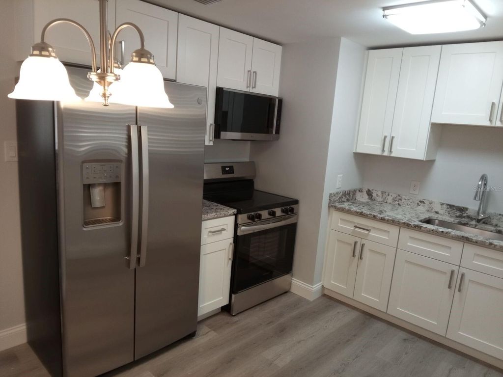 Photo of 426 E Virginia Ave, Punta Gorda, FL 33950 (MLS # C7522291)