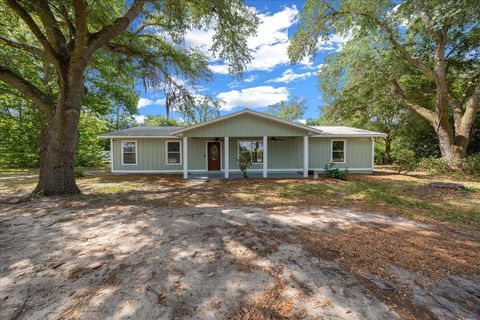 Photo of 1869 SW 32nd Place, Bell, FL 32619 (MLS # OM723972)