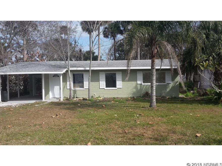 This  cement block house has been recently remodeled with new subfloor and joists and new tile floors. New roof in 2013. Third bedroom could be Florida Room with separate entrance.   Large laundry room has half bath in it. Central air. Kitchen counter and most of kitchen cupboards  have been replaced. Much vegetation in the fenced back yard which adds seclusion.. Close to shopping. Renovations are being finished up now ;Water: City