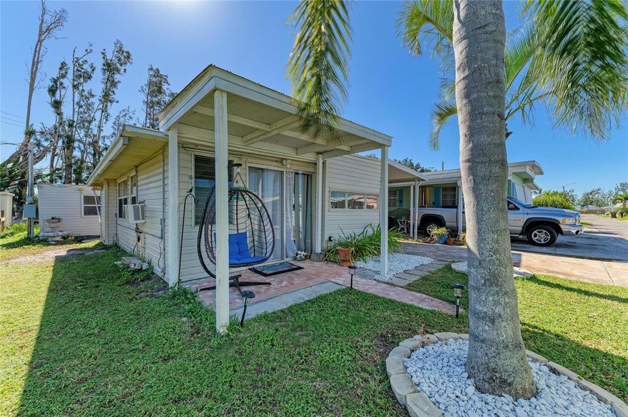 Renovated from top to bottom, this cute, affordable, home is only 1.5 miles to Bradenton Beach and a quick walk or bike ride to Cortez fishing village. The sellers have replaced the walls, flooring, electrical, appliances, cabinets, bathroom fixtures and raised the H2O heater to well above safety level and upgraded the outdoor ‘barn’ with new AC, flooring and walls. Outside you’ll find a large private back yard. Sunny Shores Community offers land-owned lots and short walk to Sunny Shores Park (waterfront, grilling, kayaking, etc). Boaters and fishermen will enjoy Parrot Cove Marina and boat ramp tucked away at the end of the community and plenty of room to park your boat next to the home too. Adorable one-bedroom bungalow is offered completely furnished in a coastal theme, sure to make your vacation home a pleasure to come back to after a long winter up north! There are TWO storage buildings on the property. The driveway shed is built as a 16 X 7 workshop with workbench and the backyard bungalow (approx 10 X 8)could be used for arts/crafts,   office, workout room or spare sleeping space.  Not to worry, you still have room to park your vehicle in the driveway and under roof. Quick access from Parrot Cove to the deep water of Palma Sola Bay opening to Anna Maria Sound and the Gulf of Mexico. The community offers an OPTIONAL annual $80 HOA fee to include planned events, shuffleboard and clubhouse. The location is perfectly situated within 1.5 miles to the beach, restaurants, shopping and so much more awaits you. Sellers have documented their rebuild, call today for more information or to see this little beauty.