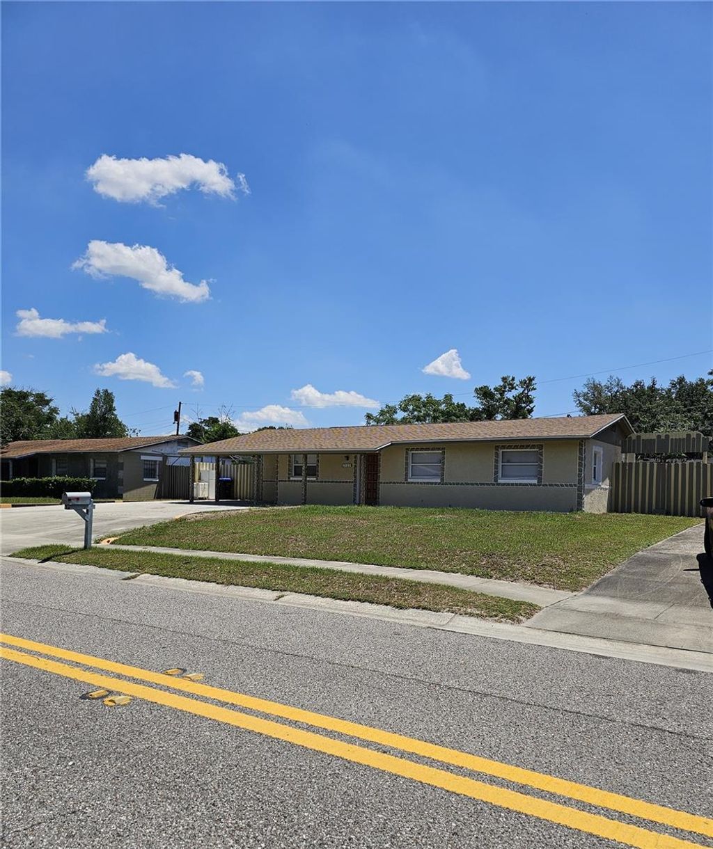 Photo of 3709 Westgate Road, Orlando, FL 32808 (MLS # O6411528)