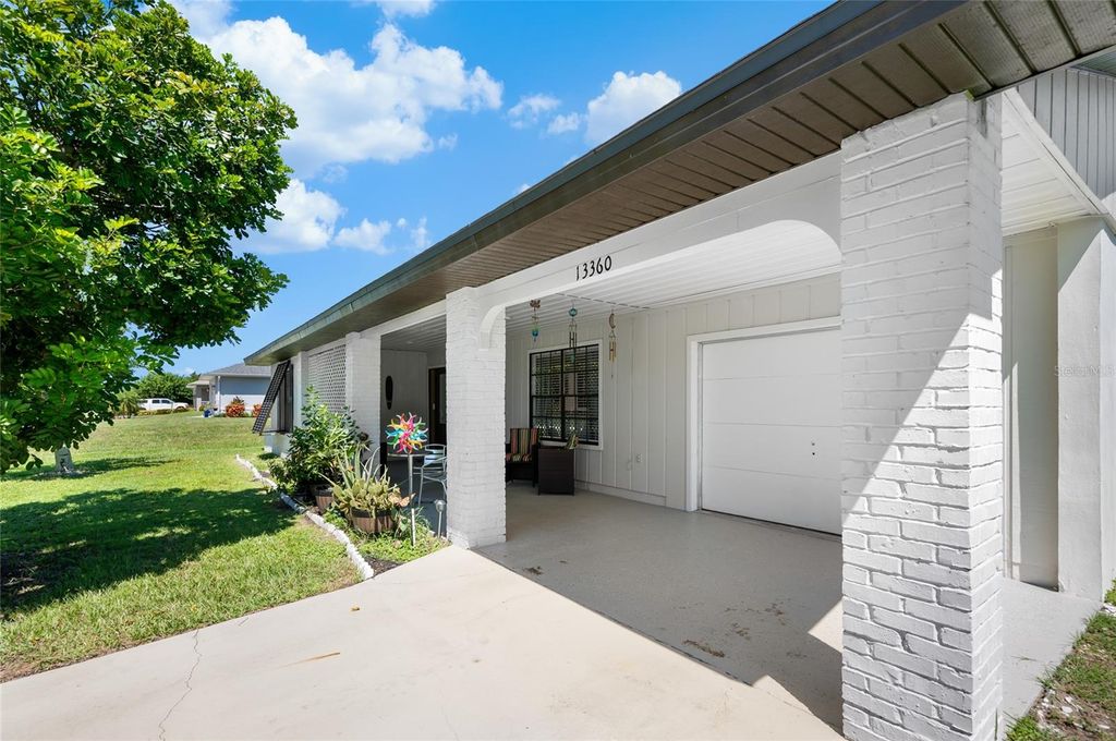 Photo of 13360 Foresman Boulevard, Port Charlotte, FL 33981 (MLS # D6143468)