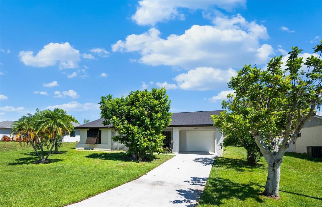 Photo of 13360 Foresman Boulevard, Port Charlotte, FL 33981 (MLS # D6143468)