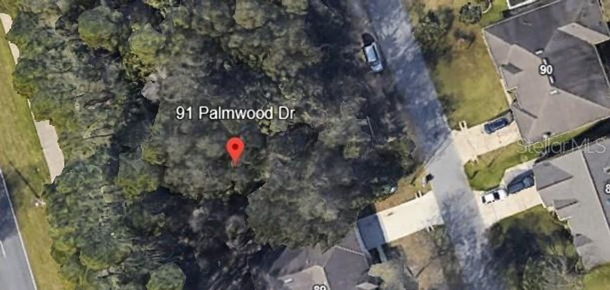Build your dream home on this fantastic vacant lot located at 91 Palmwood Drive in the heart of Palm Coast! This spacious homesite offers the freedom to bring your own builder with no HOA, no CDD, utilities available, and no build time restrictions—a rare find in a growing area. Enjoy the convenience of being close to shopping, dining, medical facilities, parks, golf courses, and beautiful Flagler Beach. Whether you're ready to build now or want to invest for the future, this centrally located lot offers endless potential in one of Palm Coast’s most desirable neighborhoods. Don’t miss out—secure your slice of Florida today!
