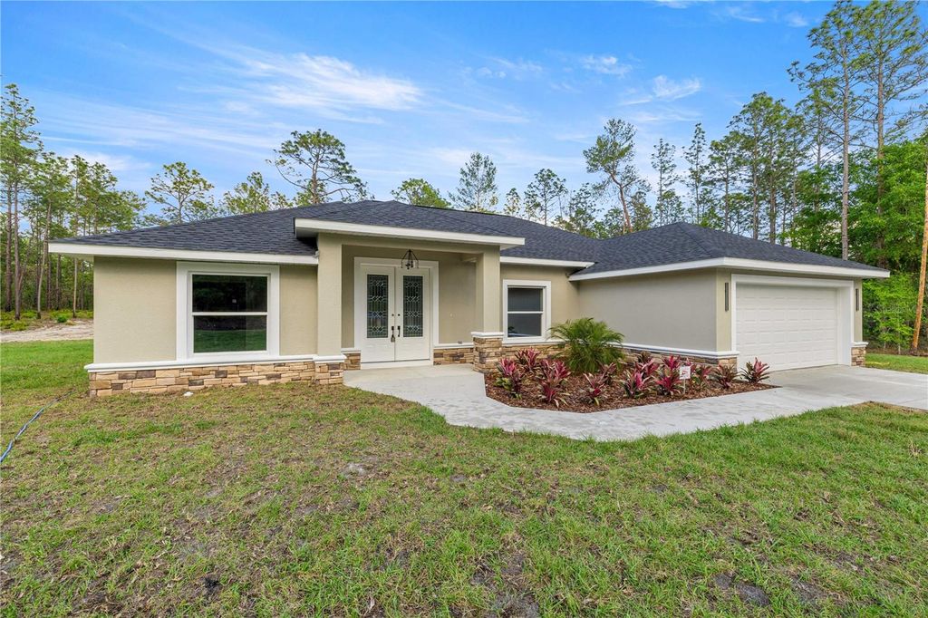 Photo of 6191 SW 134th Terrace Road, Ocala, FL 34481 (MLS # OM723570)