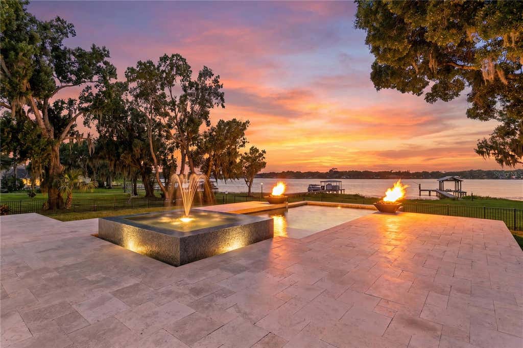 Photo of 14802 Lake Magdalene Circle, Tampa, FL 33613 (MLS # TB8519269)