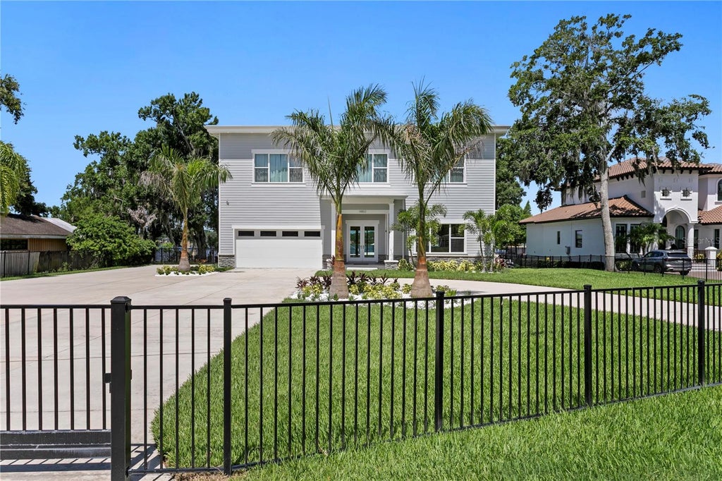 Photo of 14802 Lake Magdalene Circle, Tampa, FL 33613 (MLS # TB8519269)