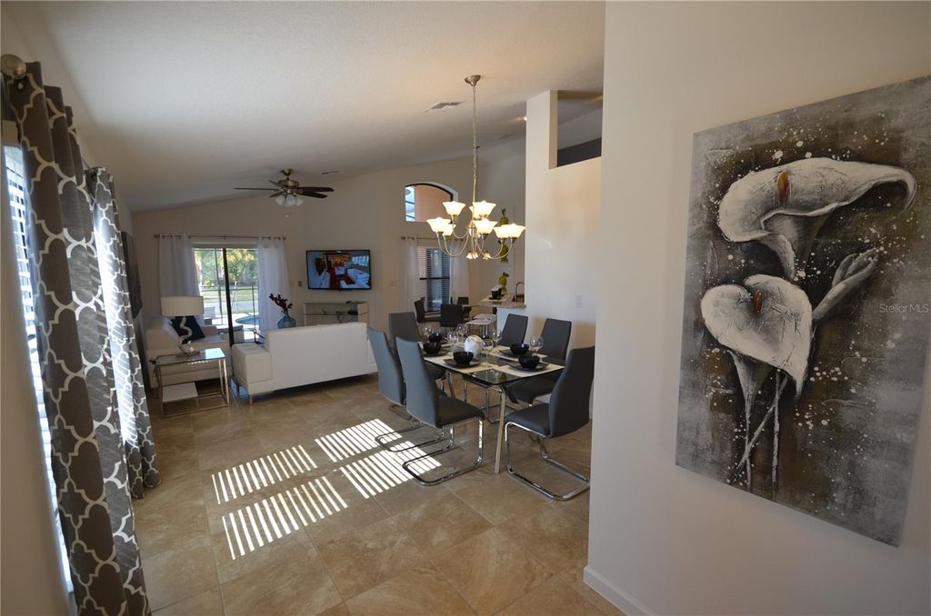 Photo of 2647 Tranquility Way, Kissimmee, FL 34746 (MLS # O6406373)