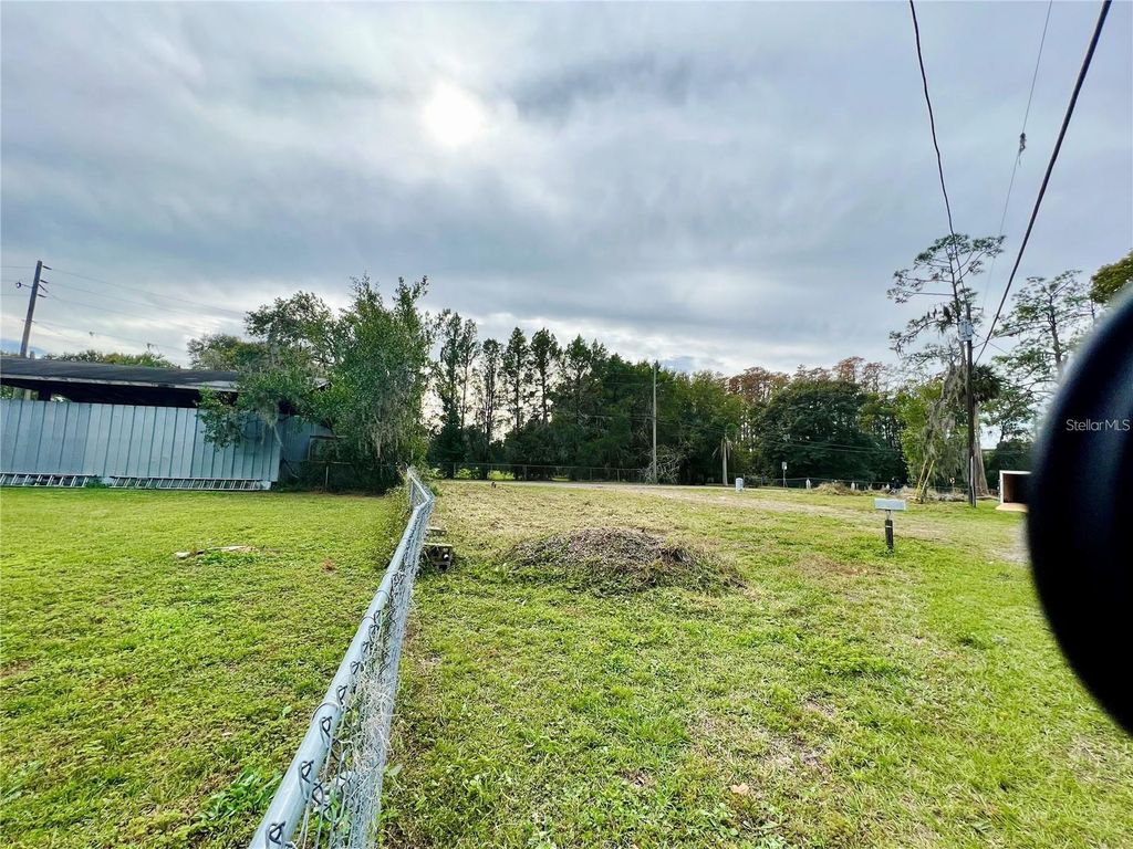 Photo of 21750 Pineywood Loop, Land O Lakes, FL 34639 (MLS # TB8409572)