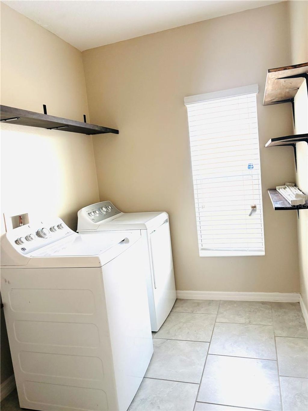 Photo of 2751 Wadeview Loop, Saint Cloud, FL 34769 (MLS # S5141276)