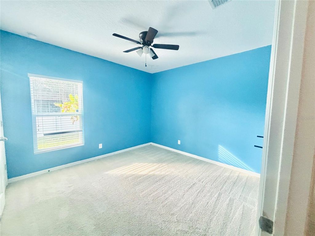 Photo of 2751 Wadeview Loop, Saint Cloud, FL 34769 (MLS # S5141276)