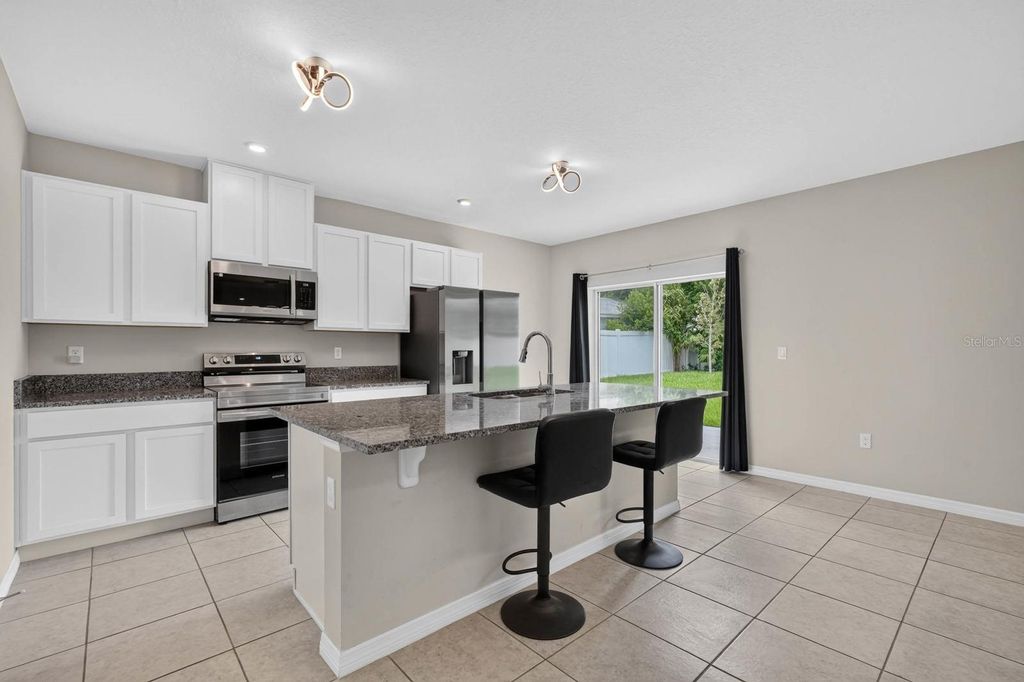 Photo of 2323 Fern Palm Drive, Edgewater, FL 32141 (MLS # V4950194)