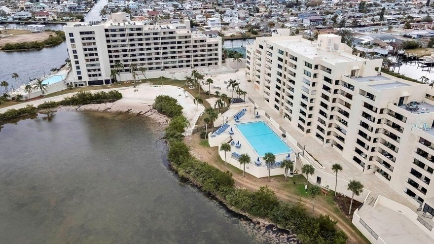 Welcome to Paradise! Located on the West Coast of Florida, this fully furnished and beautifully updated 1 bedroom, 1 bath Condo has amazing views of the Gulf. Relax on the large balcony and enjoy the gorgeous Florida sunsets. This condo is situated on the 4th floor, and the views are spectacular! There is access to the balcony from the living room and the bedroom! The kitchen includes newer appliances and a movable island with butcher block top and storage cabinets. There is an electric fireplace in the family room for those cooler nights! The bath includes a large walk-in shower with updated tile and glass doors and has a linen closet. New energy efficient sliding glass doors and windows. The laundry room is located just down the hall. The association amenities include an Olympic size heated saltwater pool, a private beach area, pickleball courts and tennis courts, gym, and so much more. Boat dock and slips available. Pet friendly resort. Security guard, gated community. Great for a vacation rental or full-time living!