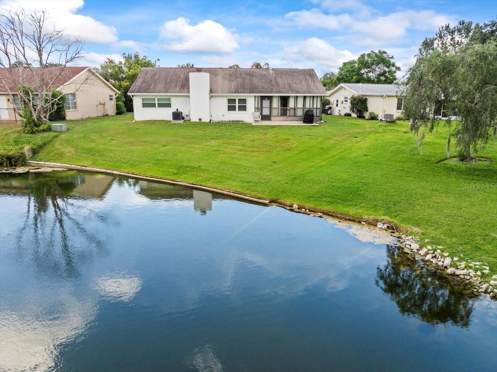 Photo of 7624 Summertree Lane, New Port Richey, FL 34653 (MLS # TB8430498)