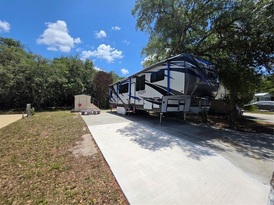 Tucked just off Saddlebag Lake in the peaceful 55+ South Shore Resort community, this well-maintained RV lot is ready for immediate enjoyment, whether you're planning a seasonal escape or a smart addition to your portfolio. The lot features a paved RV pad and private storage shed, with easy access to resort-style amenities including a lakefront pool, fishing dock, clubhouse, and shuffleboard courts. Pride of ownership shows throughout the beautifully kept grounds.

Conveniently close to shopping, dining, SR-60, and Florida's Turnpike. Stay connected without sacrificing the quiet charm of lakeside living. Slow down, settle in, and start your next chapter here. (Camper in the photo is not included)