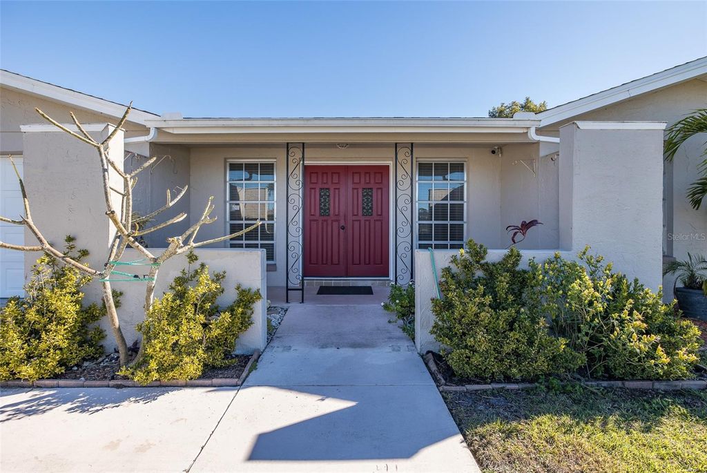 Photo of 10328 Holly Drive, Port Richey, FL 34668 (MLS # TB8465297)