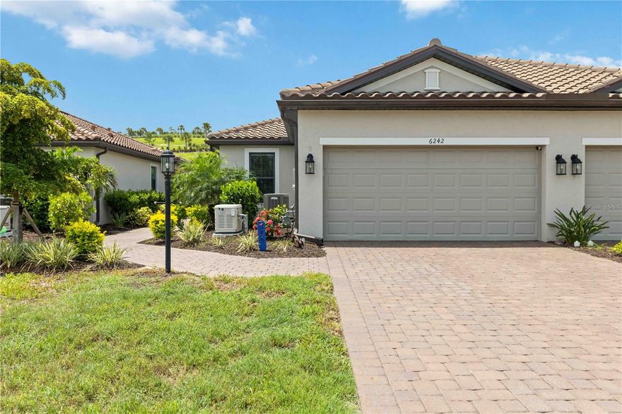 Experience resort-style living in this beautifully upgraded paired villa in the highly sought-after Taylor Morrison community of Esplanade at The Heights in Bradenton, Florida. Offering approximately 1,500 square feet of thoughtfully designed living space, this meticulously maintained home showcases true pride of ownership and presents like a professionally designed model home.
Perfectly positioned with desirable southern rear exposure and peaceful park views, this villa combines luxury finishes, smart upgrades, and low-maintenance Florida living in one exceptional package. Inside, you’ll find a stunning custom feature wall with an electric fireplace creating a warm and sophisticated focal point in the main living area. The open-concept floor plan is enhanced by upgraded walk-in closet systems, pull-out kitchen drawers for maximum functionality, and designer touches throughout.
The kitchen flows seamlessly into the living and dining spaces, ideal for entertaining or everyday living. Additional premium upgrades include epoxy-coated garage floors, a UV light air purification system integrated into the A/C, water softener treatment system, tankless hot water heater, and a whole-home Generac generator for added peace of mind and convenience.
Located within the gated resort-lifestyle community of Esplanade at The Heights, residents enjoy access to exceptional amenities including a resort-style pool and spa, clubhouse, fitness center, pickleball courts, tennis courts, bocce ball, walking trails, firepit gathering areas, dog park, and an active social lifestyle program. Conveniently located near Lakewood Ranch, University Town Center, Sarasota-Bradenton International Airport, top-rated beaches, dining, shopping, golf, and downtown Sarasota, this home offers the perfect combination of luxury, location, and lifestyle.
If you’ve been searching for an upgraded villa in Bradenton with resort amenities, low-maintenance living, southern exposure, and designer-quality finishes, this exceptional Esplanade home is a must-see.