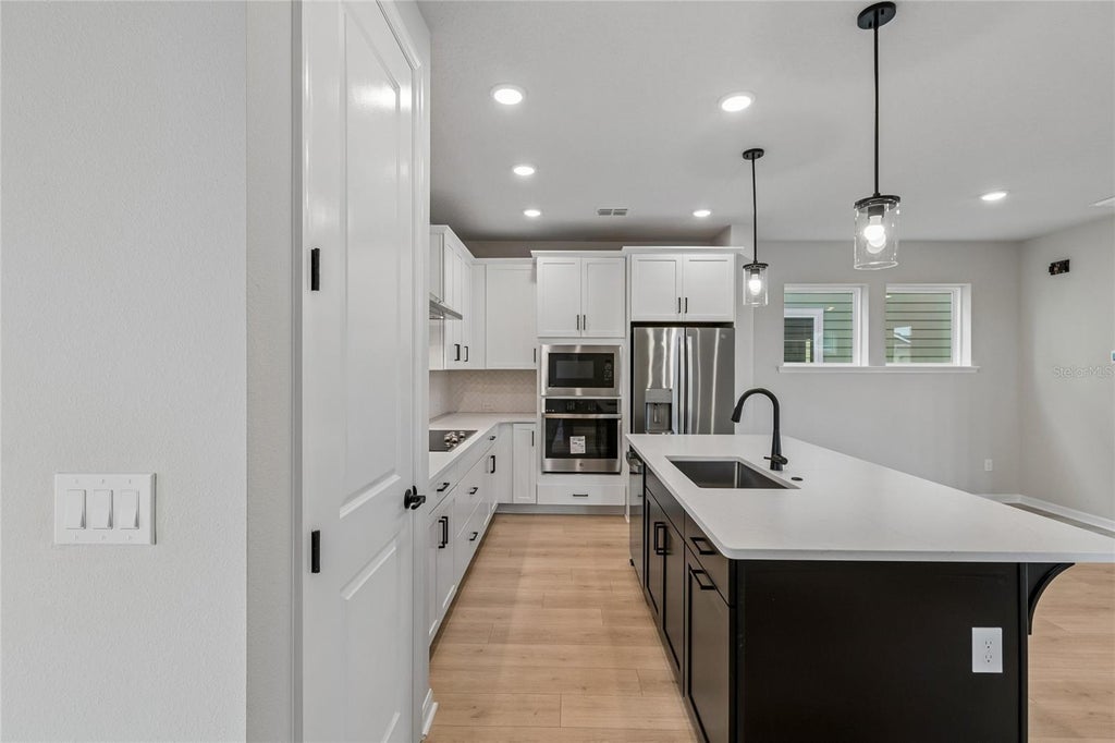 Photo of 6716 Fountain Grove Pass, Saint Cloud, FL 34771 (MLS # TB8533088)