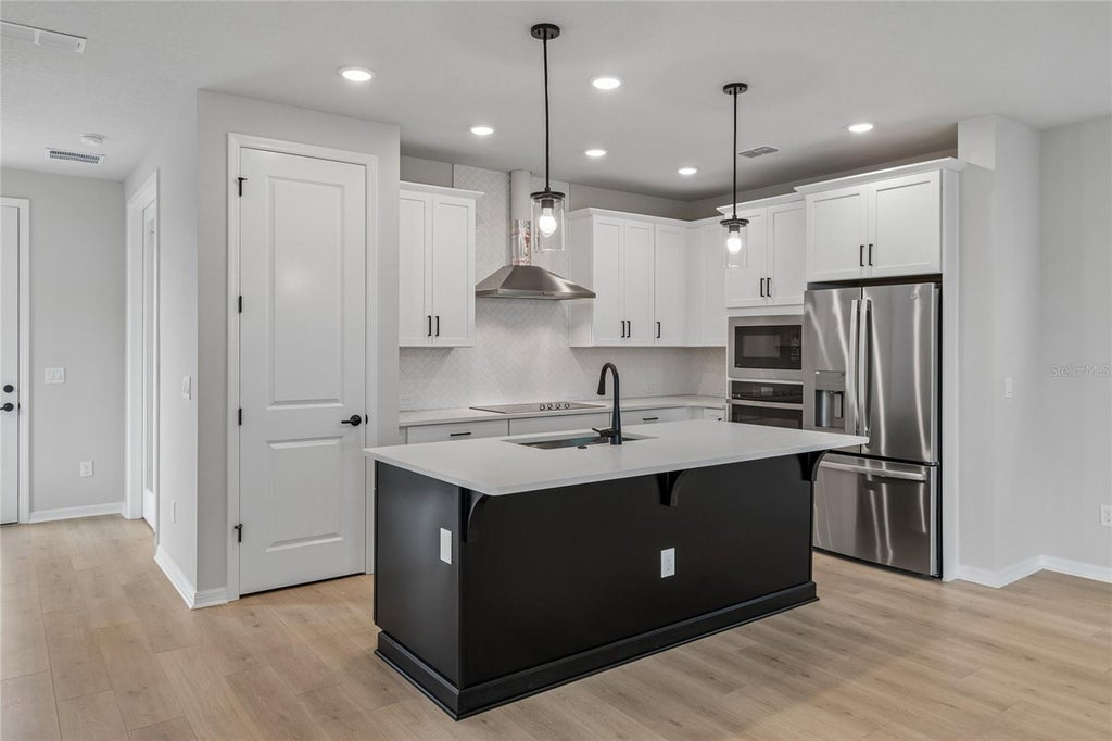 Photo of 6716 Fountain Grove Pass, Saint Cloud, FL 34771 (MLS # TB8533088)