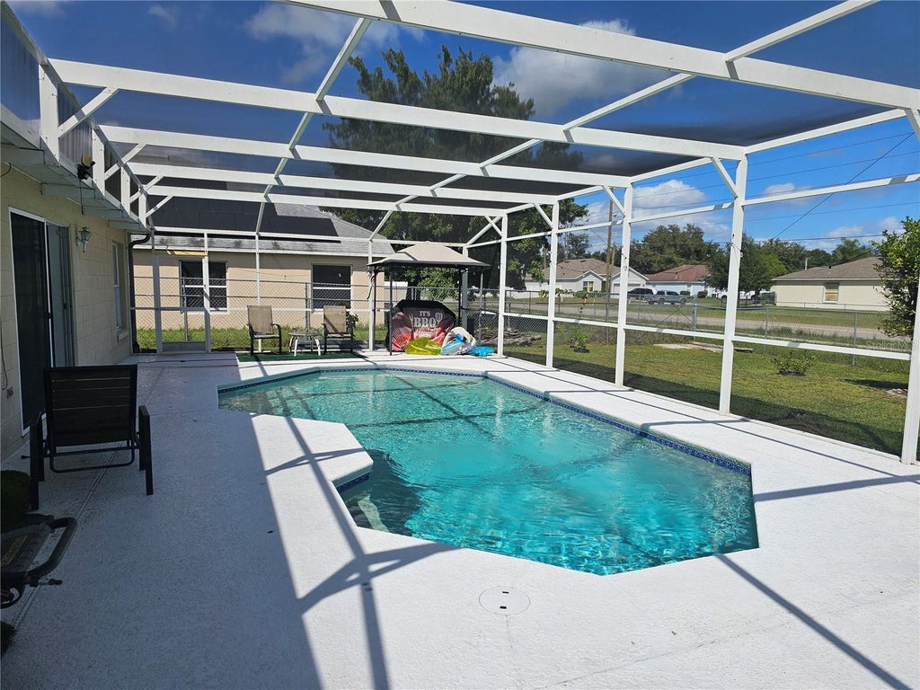Photo of 405 Martigues Drive, Kissimmee, FL 34759 (MLS # S5159948)