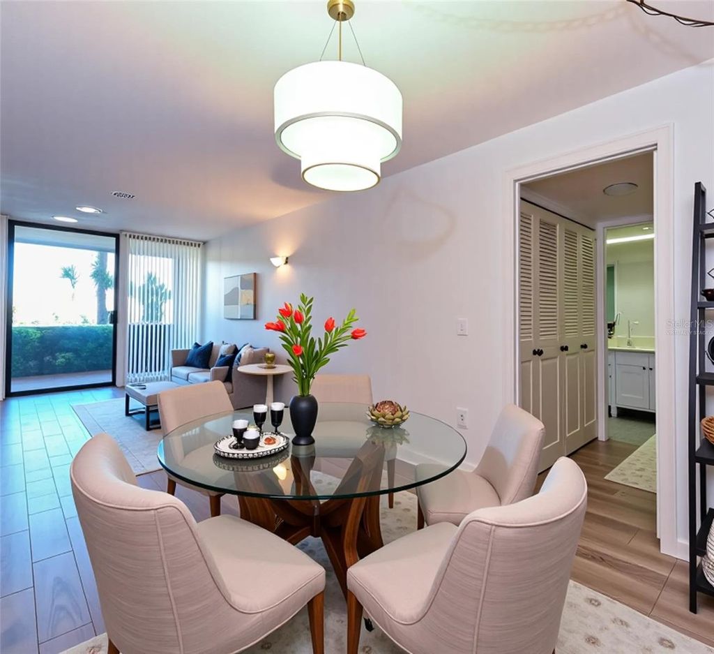 Photo of 618 Bird Bay Drive S #111, Venice, FL 34285 (MLS # TB8386378)