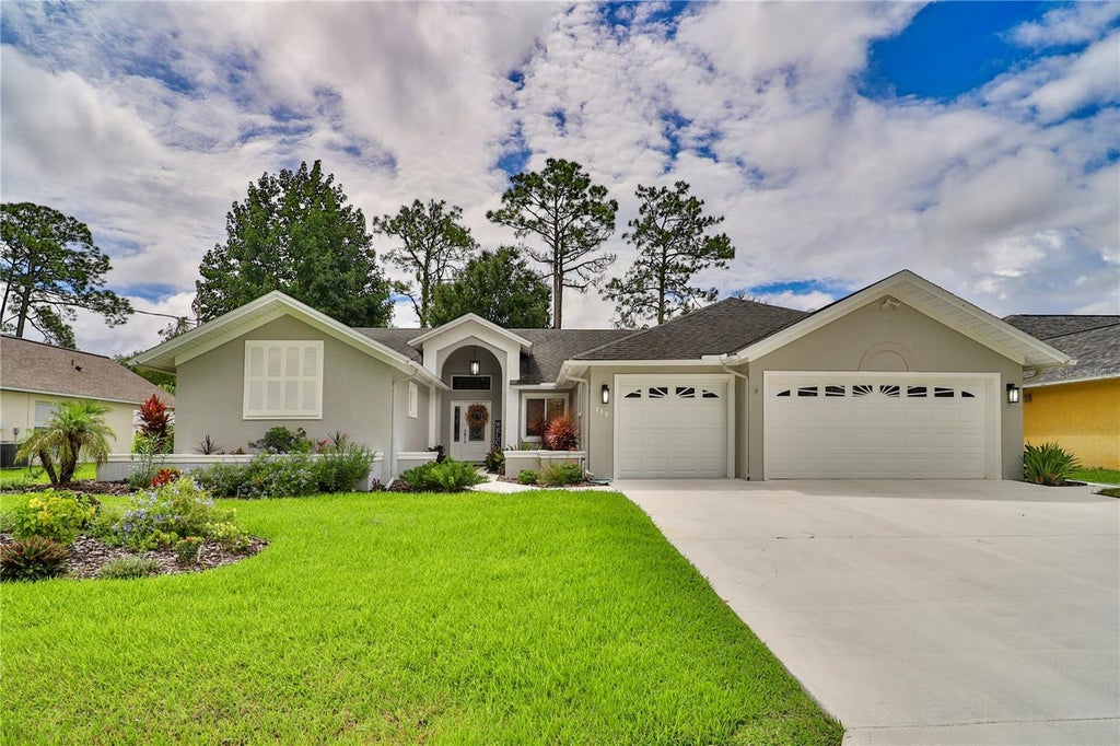 Photo of 112 NE Wellstone Drive, Palm Coast, FL 32164 (MLS # FC321257)
