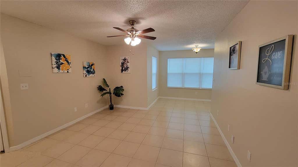 Photo of 5785 Gatlin Avenue #714, Orlando, FL 32822 (MLS # O6429919)