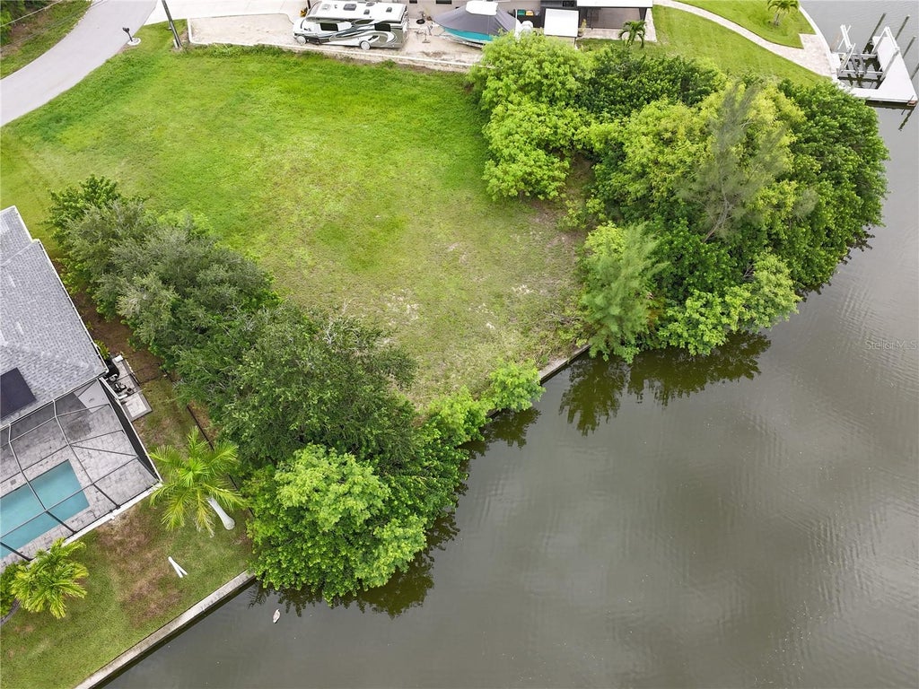 Photo of 10499 Sarasota Road, Port Charlotte, FL 33981 (MLS # C7530417)