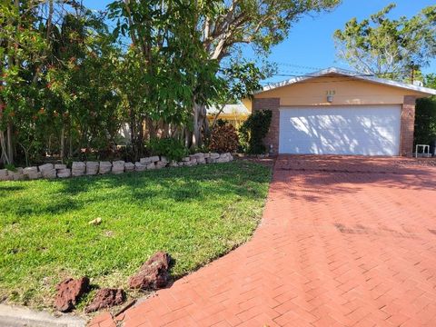 Photo of 315 S Tessier Drive, St Pete Beach, FL 33706 (MLS # TB8410465)