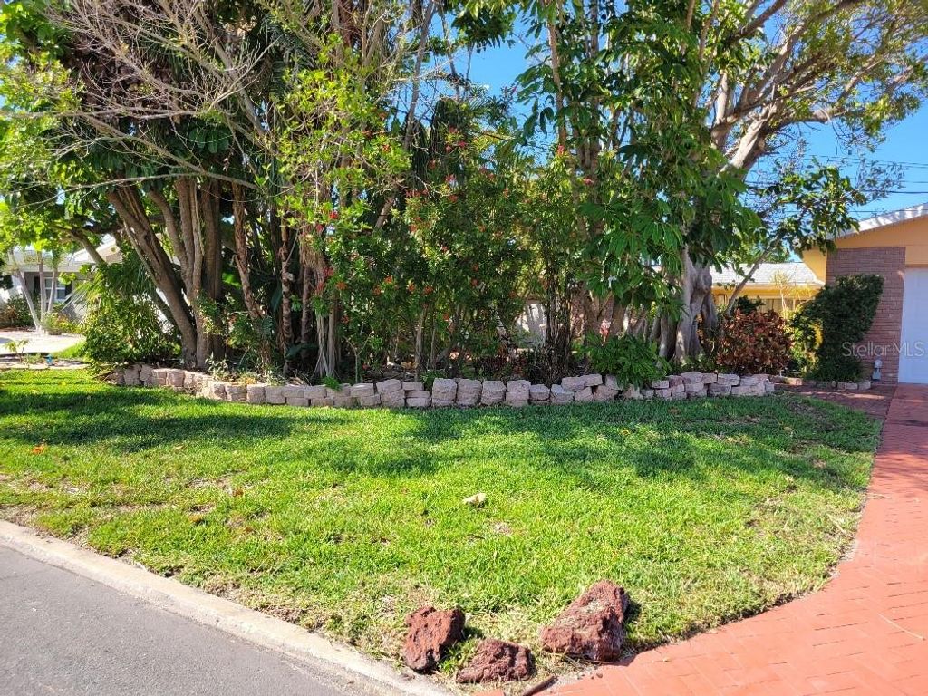 Photo of 315 S Tessier Drive, St Pete Beach, FL 33706 (MLS # TB8410465)