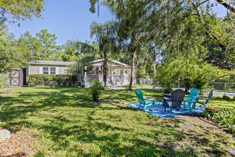 Looking for land to spread out? Then this property is a Must see! Well kept & updated Manufactured
home on large lot1.23 acres in all, in a community with no HOA. You can have goats, chickens,
roosters & pigs here! Across the street & a bit down from this home, Lot 6 Pine Valley along with
lots 7, 8 and 9 all on the lake for a total of Approximately 1.76 Acres on Twin Lake in the Pine
Valley Subdivision are also available MLS O6331281 to purchase at an additional $120,000/approx. 1.76 acres on
Twin Lake.
