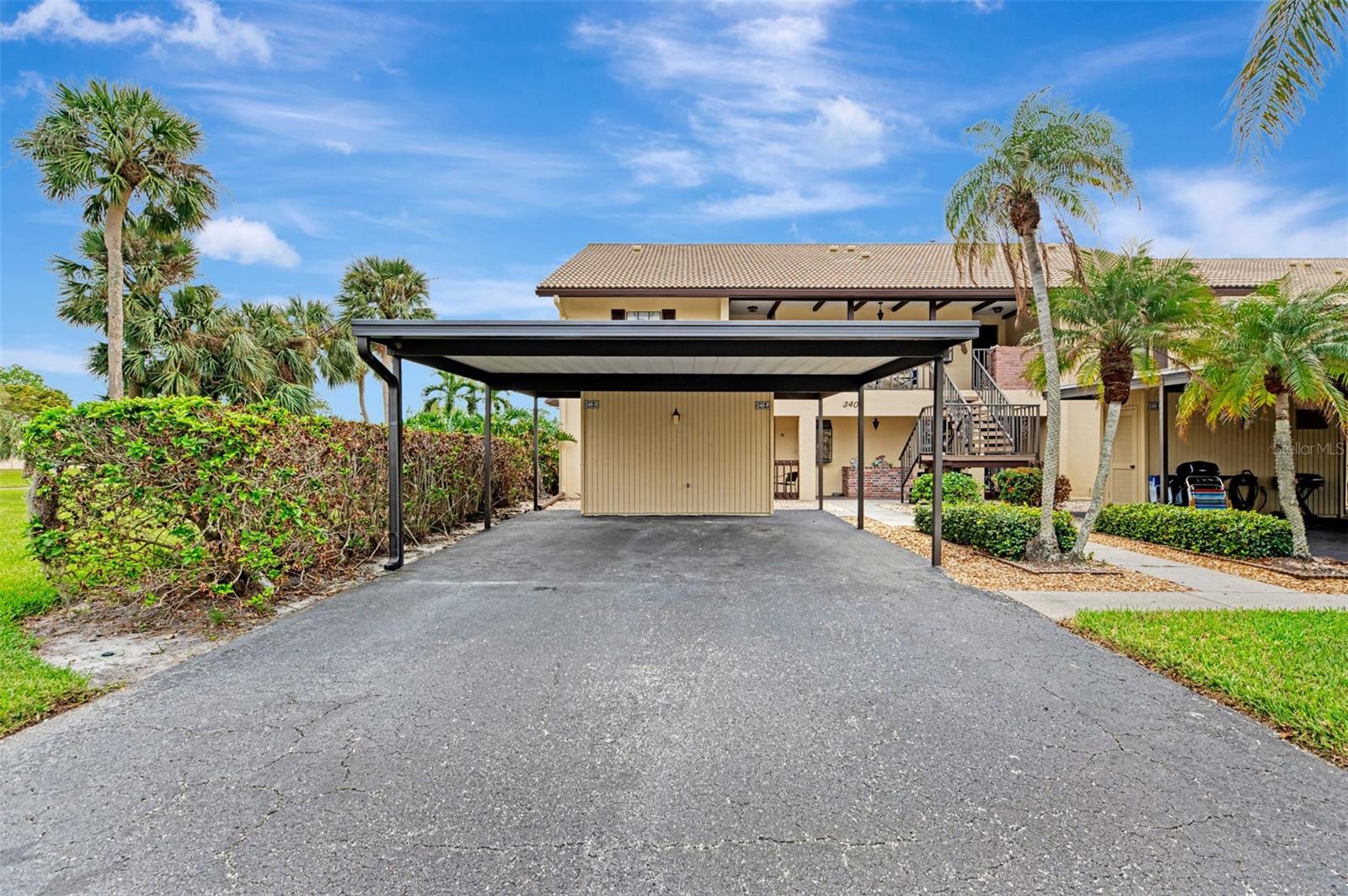 Welcome to Mission Lakes! This community is centrally located and close to all Venice has. Only 3 miles to downtown Venice. Come enjoy our many miles of Gulf beaches, restaurants galore, The Legacy Trail, Venice Theatre, the Preforming Arts Center, quaint shops, Saturday morning Farmers Market, festivals and fairs. Tennis, pickle ball, basketball courts and golf courses. Venice has it all! Sharks tooth hunting? Well you came to the right place! Shopping centers are conveniently located; just minutes away. Relax and enjoy your lake views and all its natural beauty from your screened lanai. What a way to start and end your day! This FULLY FURNISHED, 2 bed, 2 bath, split floor plan, GROUND FLOOR END UNIT boasts lots of natural light. Laundry area is inside the unit. Kitchen and baths updated. HVAC 2022 AND NEWER HOT WATER HEATER! Two cars? No problem. Tandem parking allows for one car under carport and one spot behind it. Each unit comes with an outside storage unit. Community offers THREE POOLS to enjoy. Quarterly maintenance fees include basic cable TV , water, sewer, trash/recycling, escrow reserves, maintenance exterior, grounds, community pools & private road.Great for full time, winter getaway or investment. Great time to buy so bring all offers! Welcome to paradise!!!