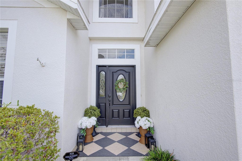 Photo of 963 Cherry Valley Way, Orlando, FL 32828 (MLS # OM729663)