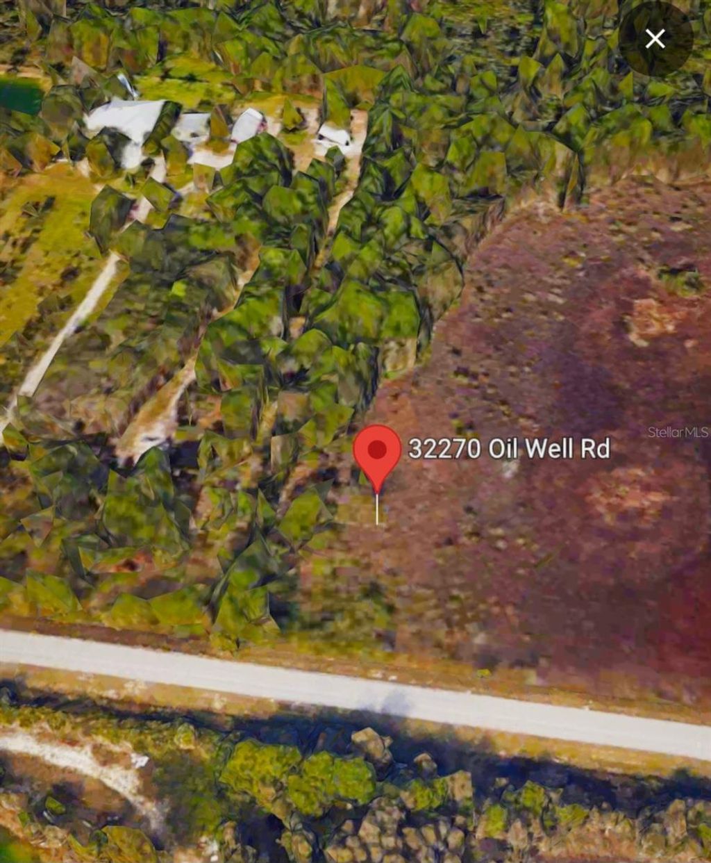 Photo of 32270 Oil Well Rd, Punta Gorda, FL 33955 (MLS # C7523349)