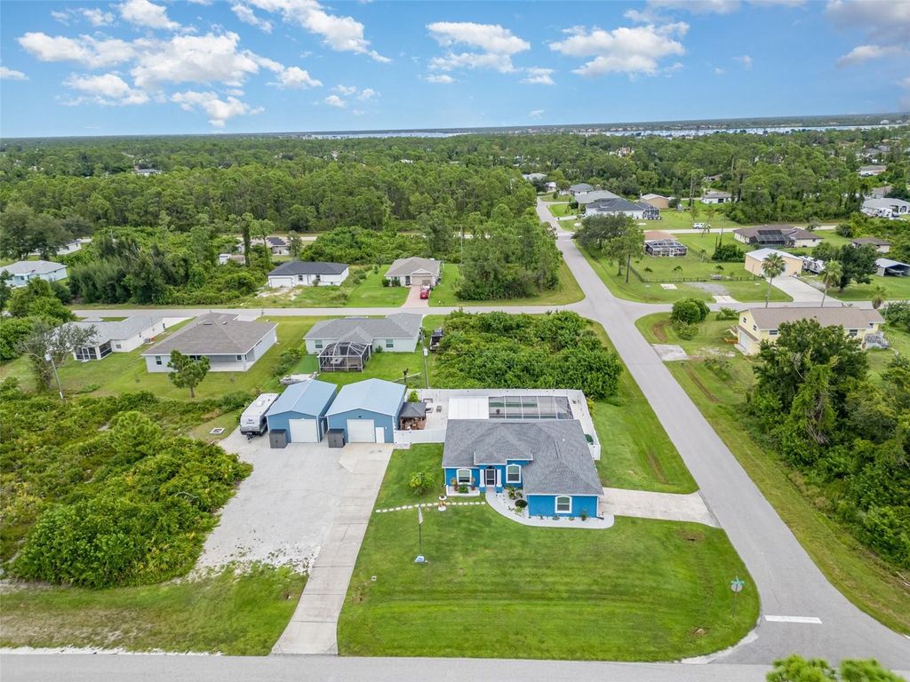 Photo of 13280 Foresman Boulevard, Port Charlotte, FL 33981 (MLS # N6140369)