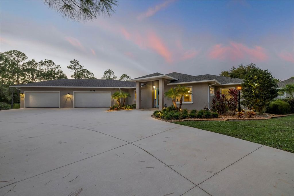 Photo of 4075 Crestwood Manor Drive, New Smyrna Beach, FL 32168 (MLS # NS1087654)