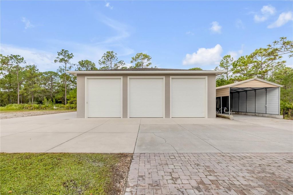 Photo of 4075 Crestwood Manor Drive, New Smyrna Beach, FL 32168 (MLS # NS1087654)