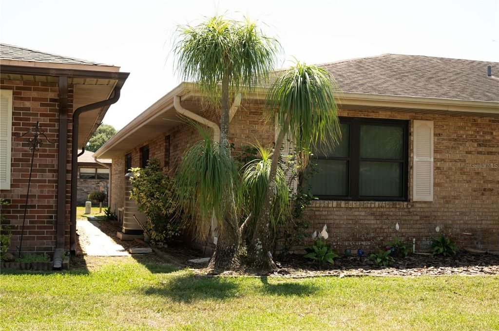 Photo of 446 Lake Carolyn Circle, Lakeland, FL 33813 (MLS # TB8376872)