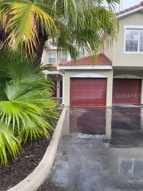 This quaint, ground floor 1 bedroom, 1 bath unit in Las Palmas is one of the few with an attached garage. The bedroom has a large walk in closet with several shelves and the kitchen has granite countertops. Open floor plan includes a built in desk and oversized lanai that backs up to a small pond and preserve. Centrally located close to UTC mall, Benderson Park and the Meadows, not far from downtown Lakewood Ranch. This gated community offers 2 resort style pools, with 2 clubhouses, full kitchen and room to entertain, state of the art fitness centers, barbecue grilles, outside kitchen, business center, lighted tennis courts, boat and RV parking and a playground as well as a car wash area. There is also a private entrance to Benderson Park. A short drive takes you to downtown Sarasota, world famous St. Armand's Circle and world famous beaches. Easy access to I-75 and Sarasota Bradenton airport.