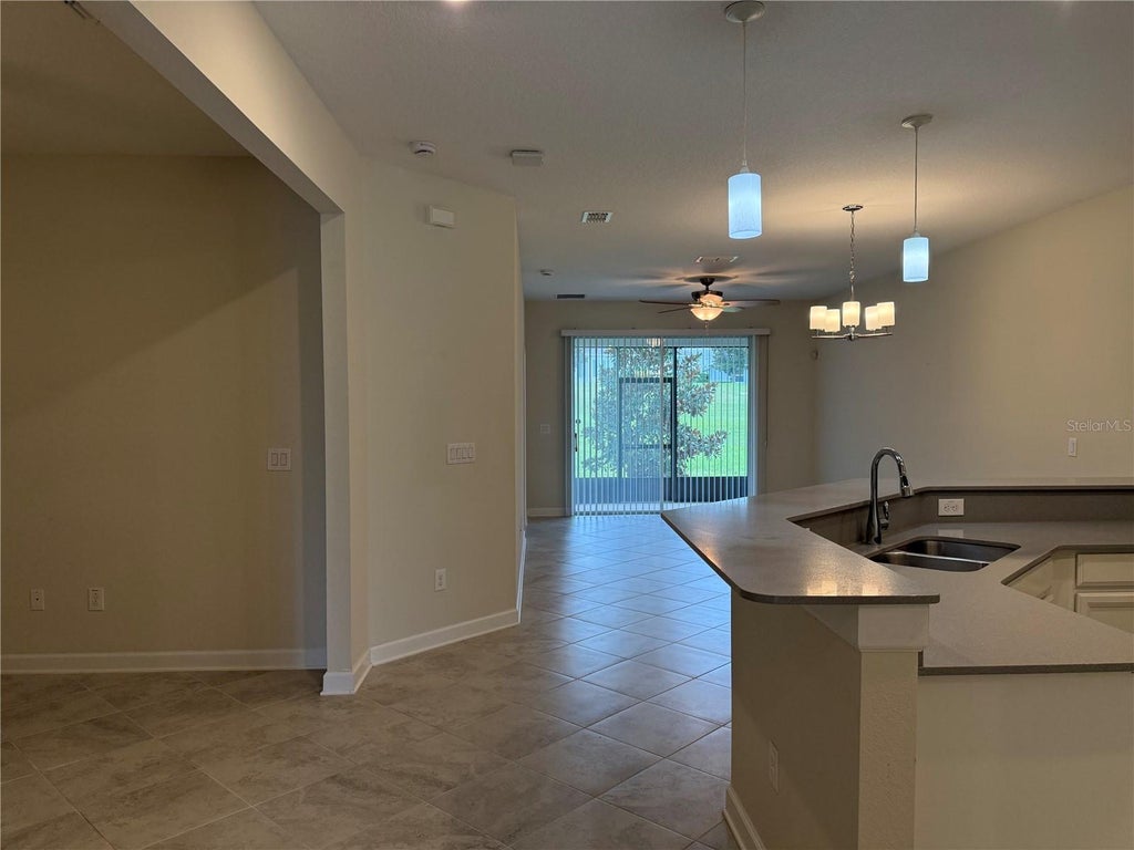 Photo of 3537 Belland Circle #E, Clermont, FL 34711 (MLS # R4911937)