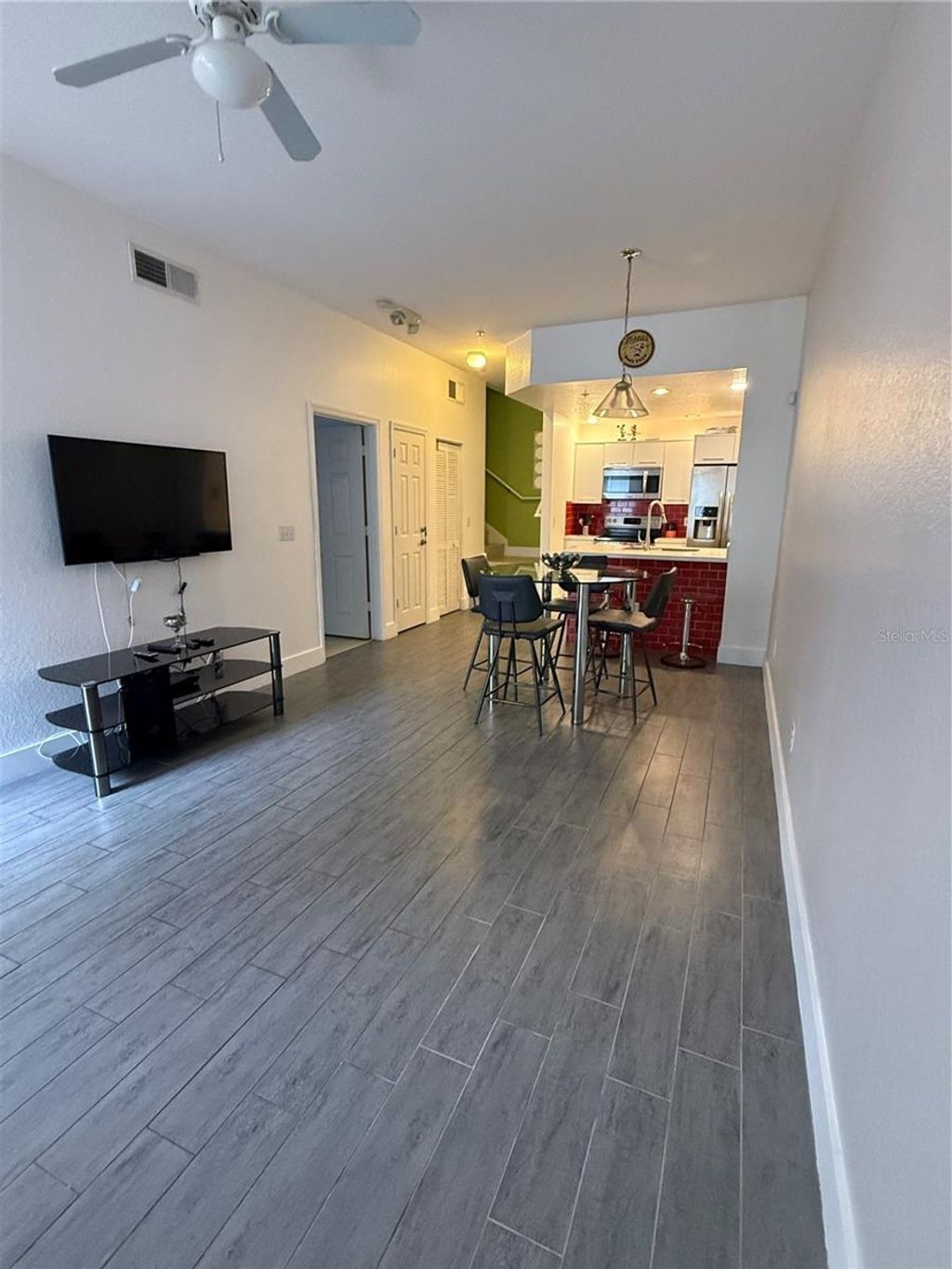 Photo of 2200 San Christabolo Drive #105, Kissimmee, FL 34741 (MLS # S5140083)