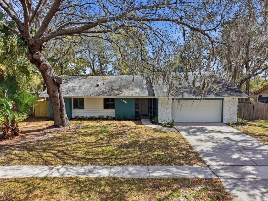 Photo of 8315 Camphor Tree Drive, Orlando, FL 32810 (MLS # O6388418)