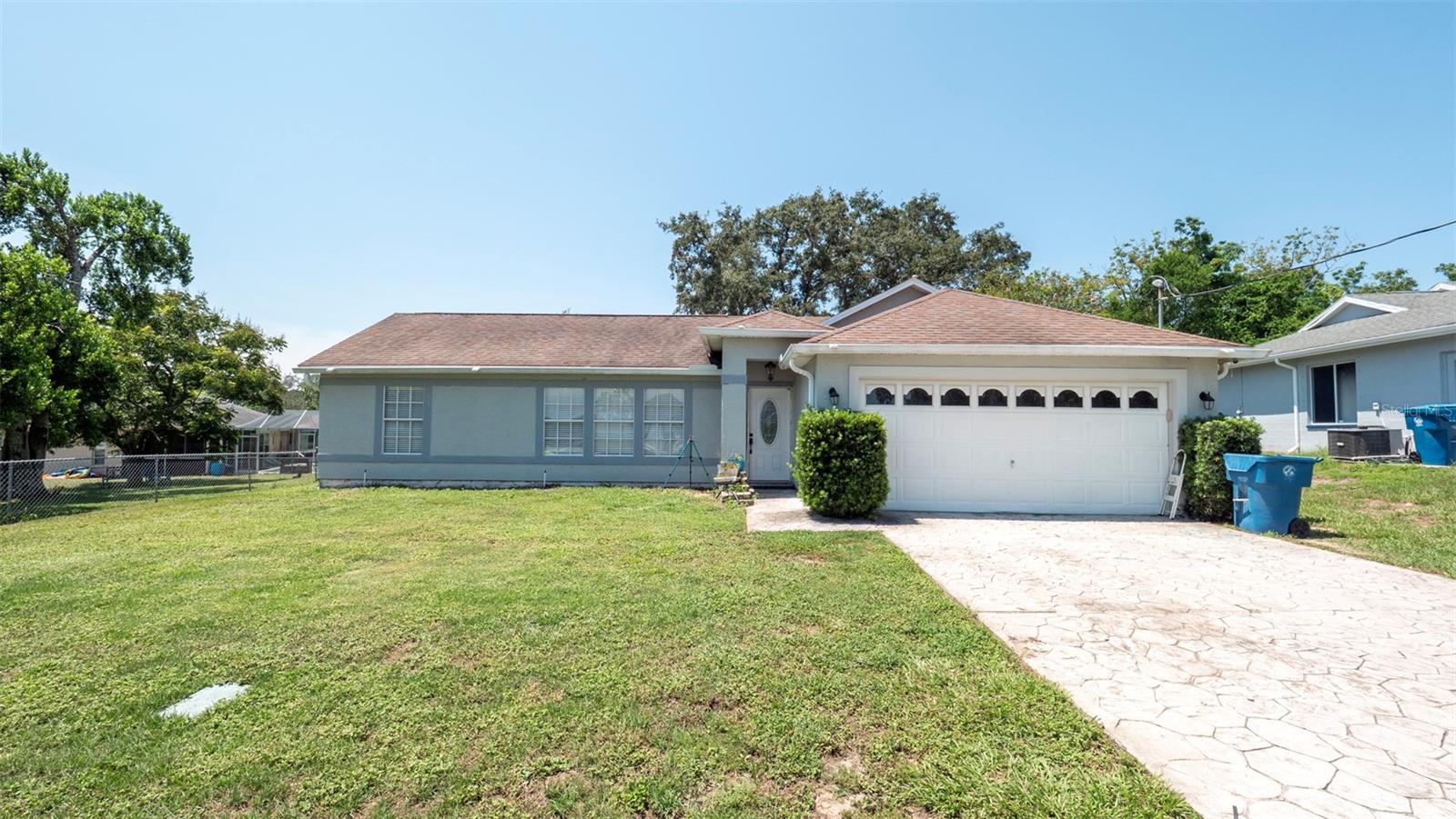 Welcome to your future home in the charming town of Spring Hill, FL! This inviting single-family residence offers 3 spacious bedrooms and 2 bathrooms, ideal for a growing family or anyone who loves to entertain. With 1,400 square feet of living space, there’s plenty of room to spread out and make lasting memories. The attached 2-car garage provides ample storage and everyday convenience.The open floor plan allows for natural light to fill the home, creating a warm and welcoming atmosphere. While it offers a solid layout and great potential, it may need some TLC—making it the perfect opportunity to add your own style and personal touches. Located in a desirable neighborhood, this property is just minutes from shopping, dining, and entertainment. Don’t miss your chance to make this house your own—schedule a showing today!