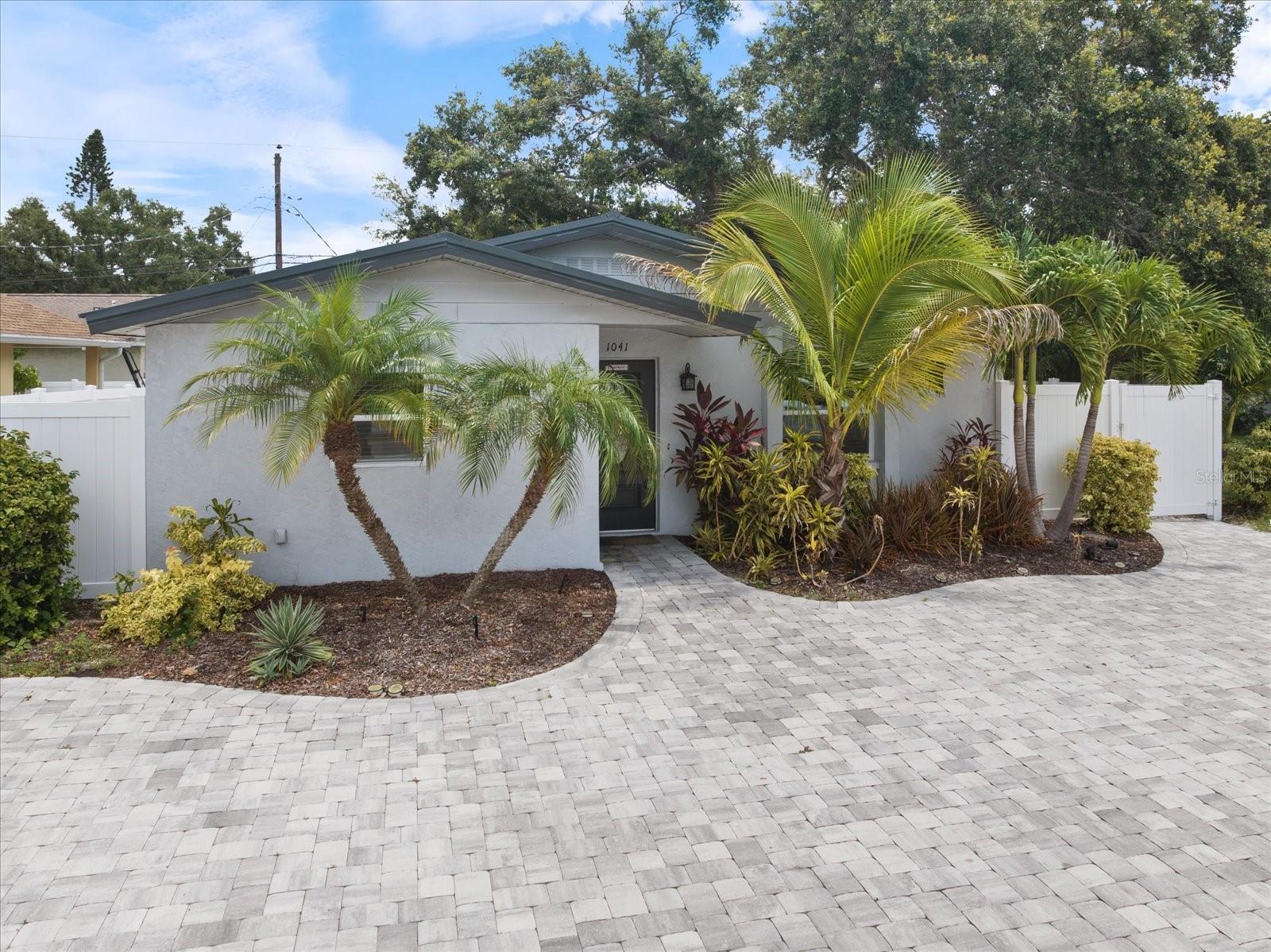 Discover a fantastic investment opportunity at 1041 South Tuttle Avenue, Sarasota. This fully remodeled turnkey property offers versatile living arrangements perfect for investors or homeowners looking for additional rental income. Currently configured as a 3-bedroom, 2-bathroom residence, it includes a private mother-in-law suite for added flexibility.
The modern open-concept kitchen is a chef's dream, boasting sleek shaker cabinets, granite countertops, and a spacious island perfect for culinary creations and entertaining guests. Enjoy the luxury vinyl plank flooring that flows seamlessly through the living spaces, bringing a contemporary and stylish feel to the home.
Step outside to your private, fully fenced yard, where a low-maintenance garden creates an ideal retreat for relaxation or entertaining. The property ensures convenience with off-street parking with a circular driveway.
Situated in a prime location close to Downtown Sarasota, Legacy Trail, Siesta Key Beach, and numerous shopping, dining, and entertainment venues, this home offers both comfort and convenience. Plus, there's an adjacent lot available, presenting even more potential for expansion or development.
Don't miss out on this exceptional opportunity in a sought-after area. Whether you're looking to invest or find a home that offers income potential, this property has it all!
