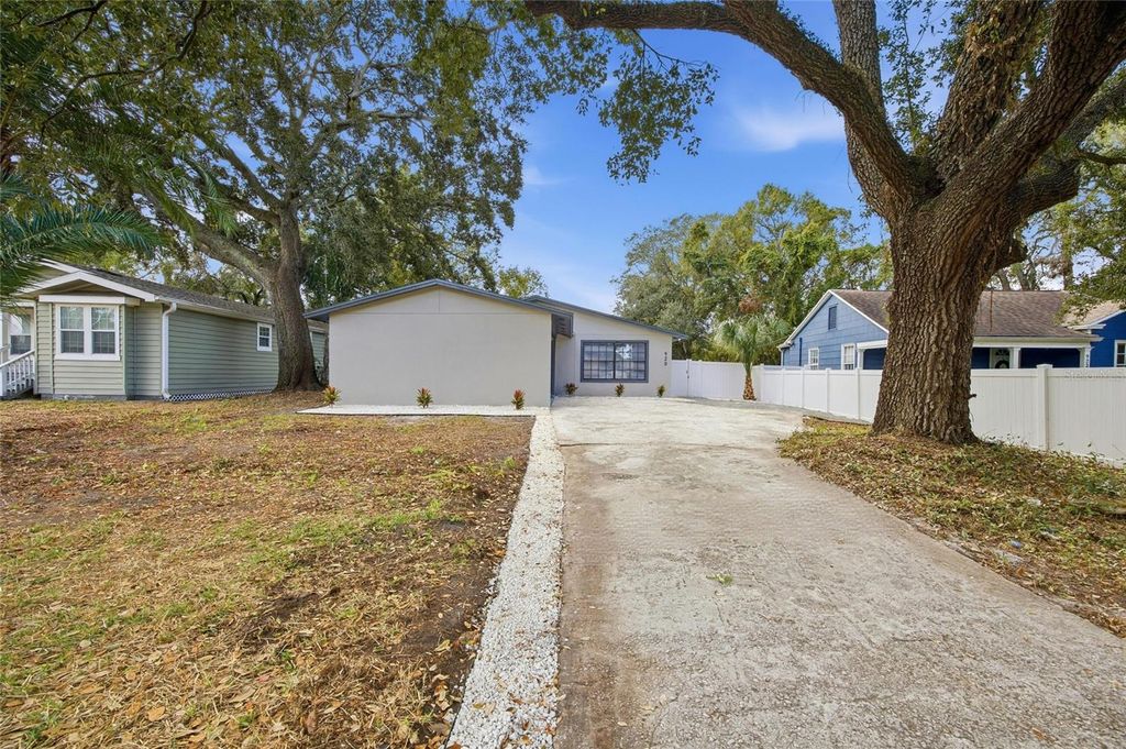 Photo of 920 W Candlewood Avenue, Tampa, FL 33603 (MLS # TB8463806)