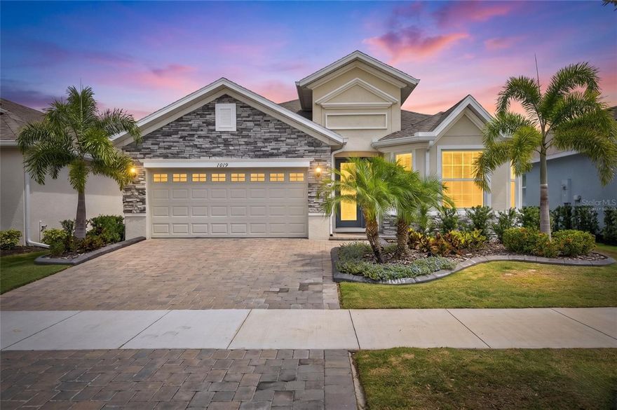 1019 Signet Dr, Apollo Beach, FL 33572 | 4 Bedrooms | 3 Bathrooms | 2,359 Sq Ft | 2-Car Garage | Park Square Homes | MiraBay
Welcome to this beautifully maintained home for sale in Apollo Beach, located in the highly sought-after MiraBay waterfront community. This 4-bedroom, 3-bath Hampton floorplan by Park Square Homes offers modern finishes, a functional layout, and a move-in ready experience designed for both everyday living and entertaining.
From the moment you enter through the glass front door with sidelight, you’ll notice the high ceilings, crown molding, and recessed lighting that create an open, elevated feel throughout the home. Tile flooring runs through the main living areas, and the split-bedroom design includes a secondary bedroom with a separate bath—ideal for guests or a true in-law setup.
The kitchen is the centerpiece of the home, designed for both function and connection. It features an oversized island with seating and pendant lighting, quartz countertops, 42-inch upper cabinets with crown molding, tile backsplash, stainless steel appliances, French door refrigerator, built-in oven, gas cooktop with hood, farmhouse sink, and a Culligan water system. The layout flows seamlessly into the main living space and out to the patio, making it perfect for gatherings.
The primary suite is privately positioned and finished with a tray ceiling accented by shiplap and crown molding. It includes a spacious walk-in closet and an ensuite bath with dual sinks, quartz countertops, an oversized glass-enclosed shower with built-in bench, framed mirror, and linen storage. Additional bedrooms are well-sized and flexible for work, guests, or everyday living.
Sliding glass doors lead to a covered, pavered patio overlooking a large backyard with plenty of space to design and build your ideal pool. The exterior continues the attention to detail with stone accents, a pavered driveway, and professionally curbed landscaping.
MiraBay is one of Apollo Beach’s premier waterfront communities, known for its coastal charm and resort-style amenities. Residents enjoy two heated pools, a two-story clubhouse with 24-hour fitness center, tennis and pickleball courts, and a full calendar of community events. Golf cart access to MiraBay Village offers convenient shopping and dining, while miles of walking trails and water access enhance the lifestyle.
Living in Apollo Beach means enjoying direct access to Tampa Bay, nearby parks, and a relaxed coastal environment while staying connected to everything the Tampa Bay area offers. With easy access to US Hwy 41, I-75, and US 301, you are within reach of Tampa, St. Petersburg, Sarasota, MacDill Air Force Base, major sports venues, concerts, the Hard Rock Casino, and Gulf Coast beaches.
This is a home where the layout makes sense, the upgrades are already done, and the lifestyle speaks for itself—ready for its next owner to step in and enjoy.