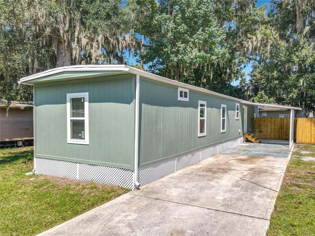 Photo of 61 Golden Gate Circle, Port Orange, FL 32129 (MLS # O6433830)