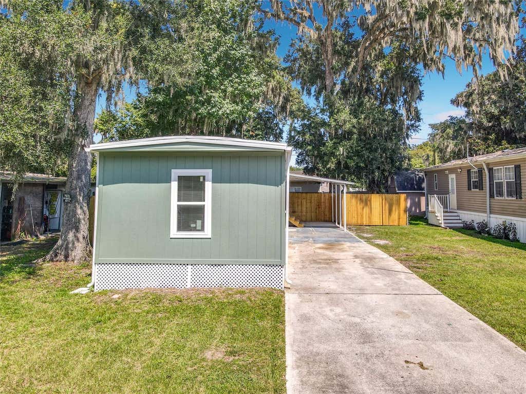 Photo of 61 Golden Gate Circle, Port Orange, FL 32129 (MLS # O6433830)